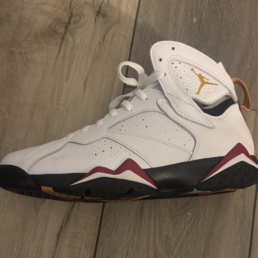 Jordan Men's White and Black Sneakers with Gold and Red Accents